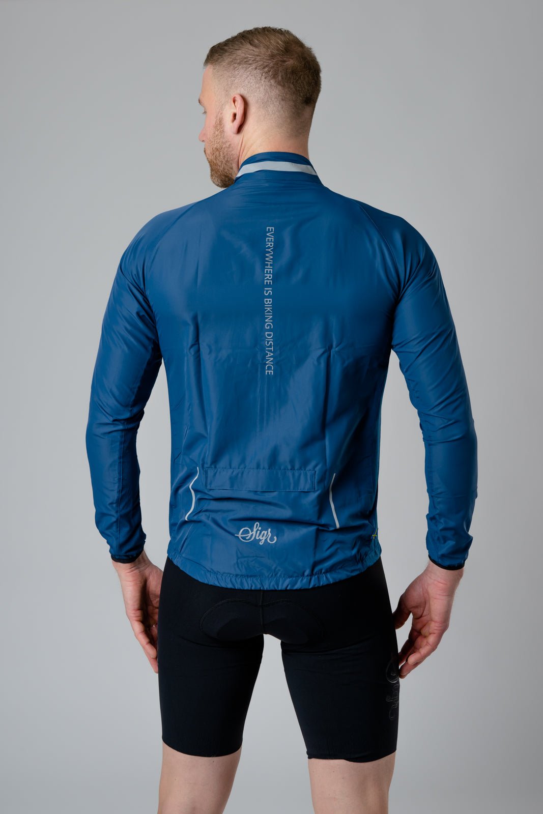 Treriksröset Blue Men's Cycling Wind/Pack Jacket by Sigr Cycling Clothing