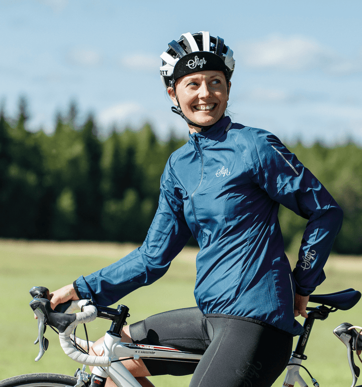 Treriksröset Blue Women's Cycling Wind/Pack Jacket by Sigr Cycling Clothing