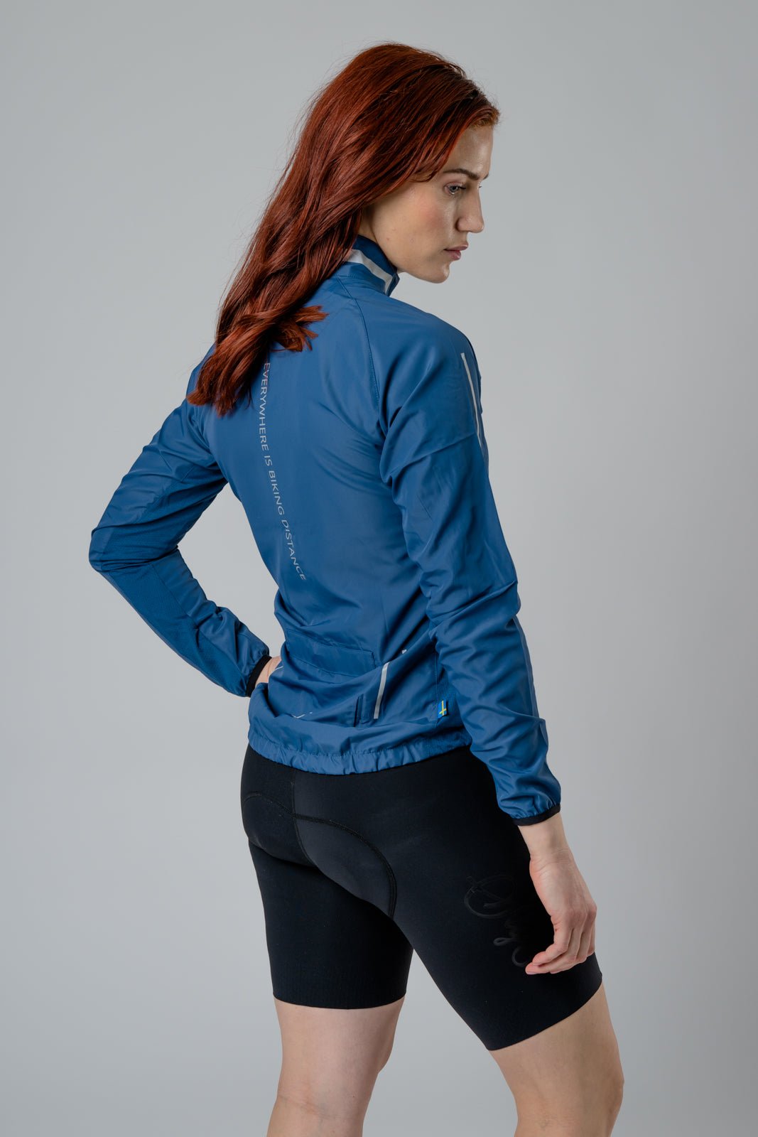 Treriksröset Blue Women's Cycling Wind/Pack Jacket by Sigr Cycling Clothing