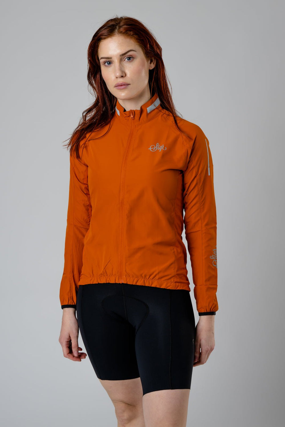 Treriksröset Orange Women's Cycling Wind/Pack Jacket by Sigr Cycling Clothing