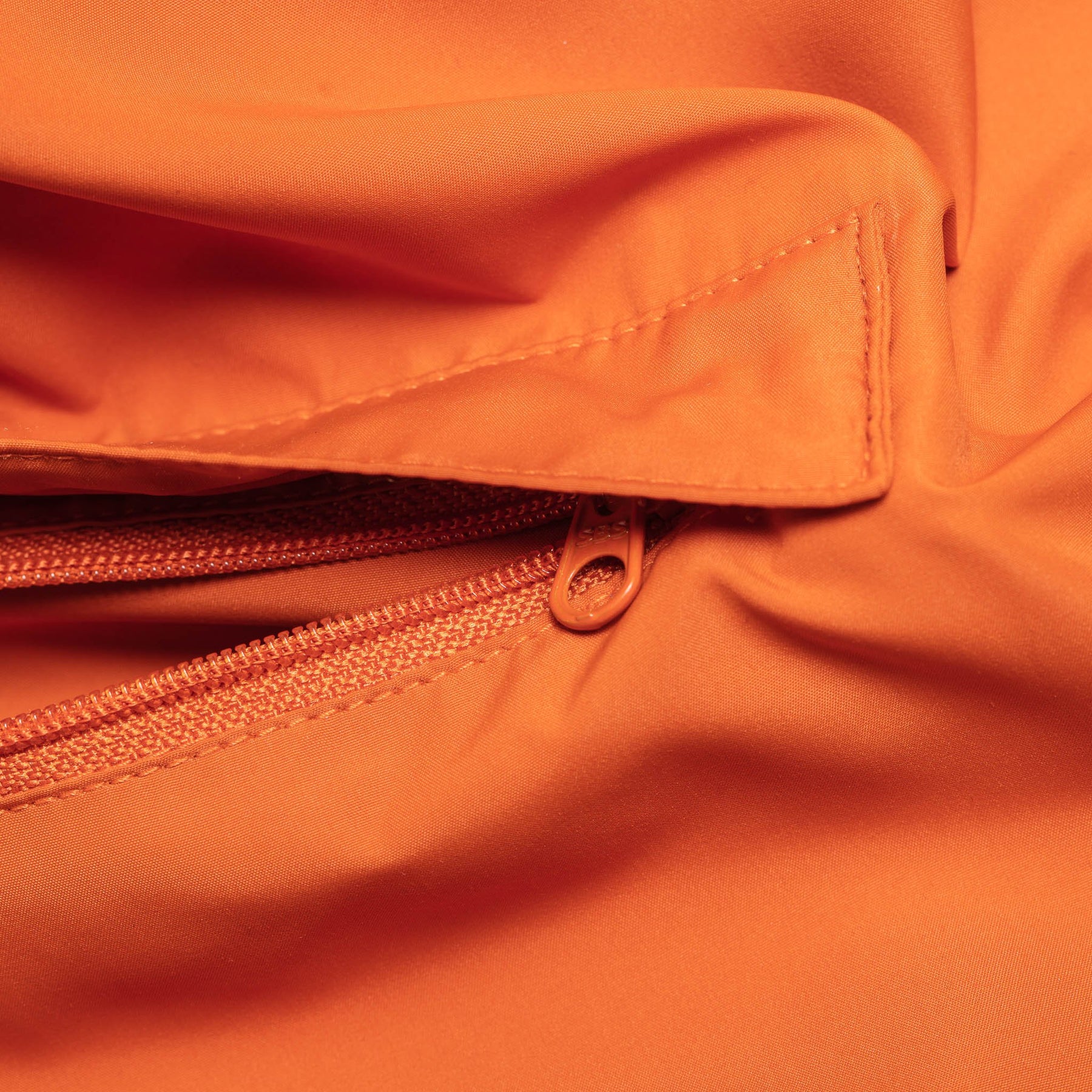 Orange Cycling Pack Jacket for Men - 'Treriksröset' by Sigr Bikewear